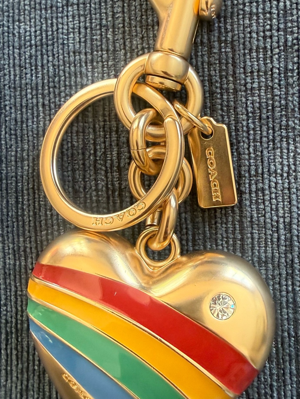 Coach Gold-Tone Heart Keychain with Red, Yellow, Green, Blue Stripes